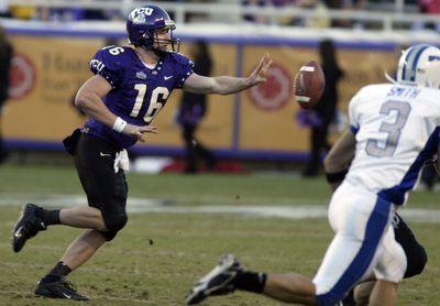 Air Force’s Nathan Smith watches as Texas Christian’s Jeff B